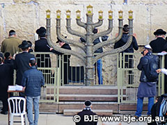 Chanukah Symbols & Foods 1 The chanukiah placed at the Kotel (Western Wall) during Chanukah
